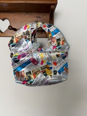 Jeanne Lottie limited edition vintage newsprint reversible purse.